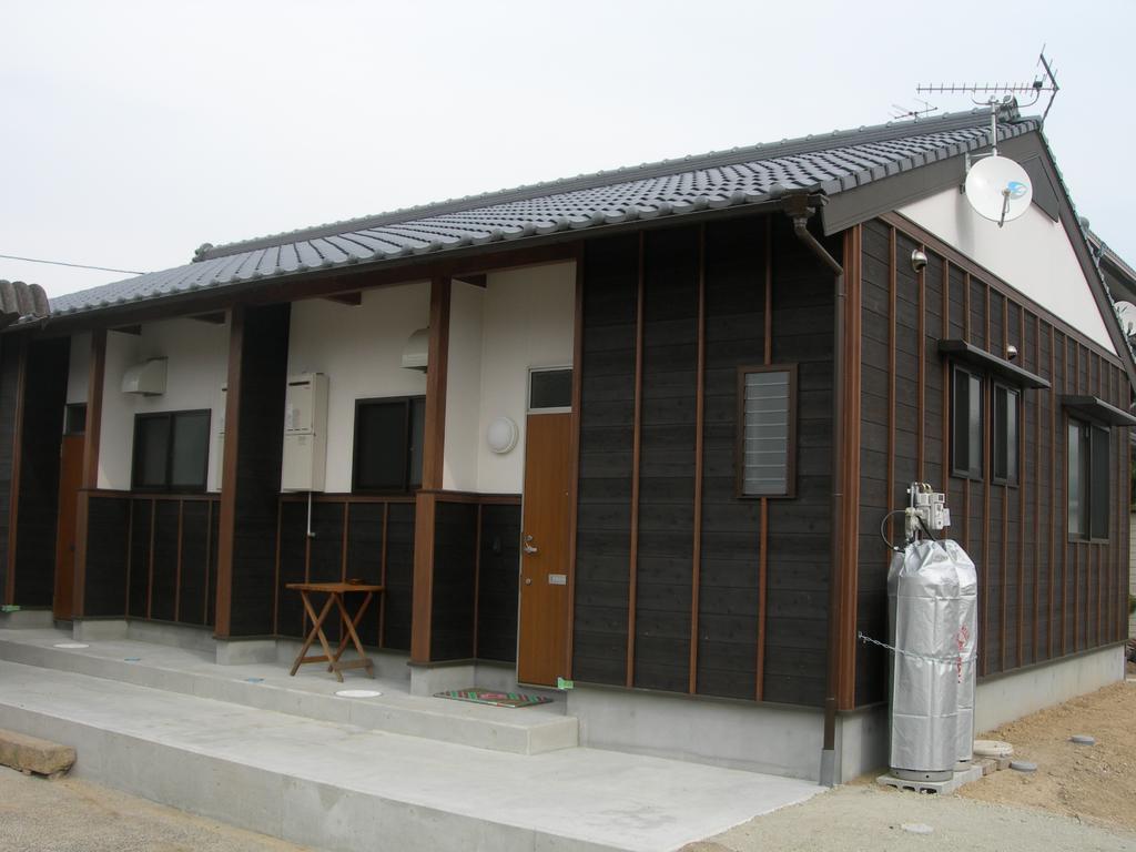 ناووشيما Guest House Oomiyake الغرفة الصورة